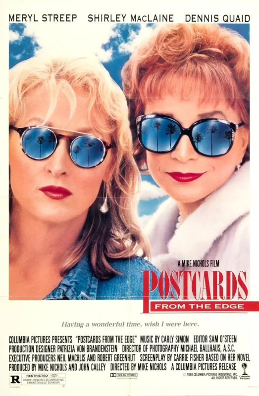 Cartel oficial de Postales desde el filo (1990), dirigida por Mike Nichols y protagonizada por Meryl Streep y Shirley MacLaine.